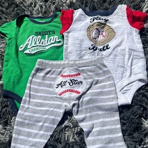 Two shirts and a pair of pants. Size 3M